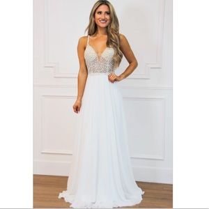 White Prom or Wedding Dress. Size 8. Brand new, never worn.